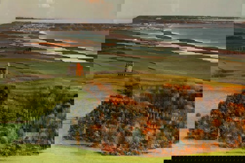 St Catherine's Chapel with views of Chesil Beach and Portland