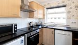 Open plan kitchen in Chesil Beach apartments