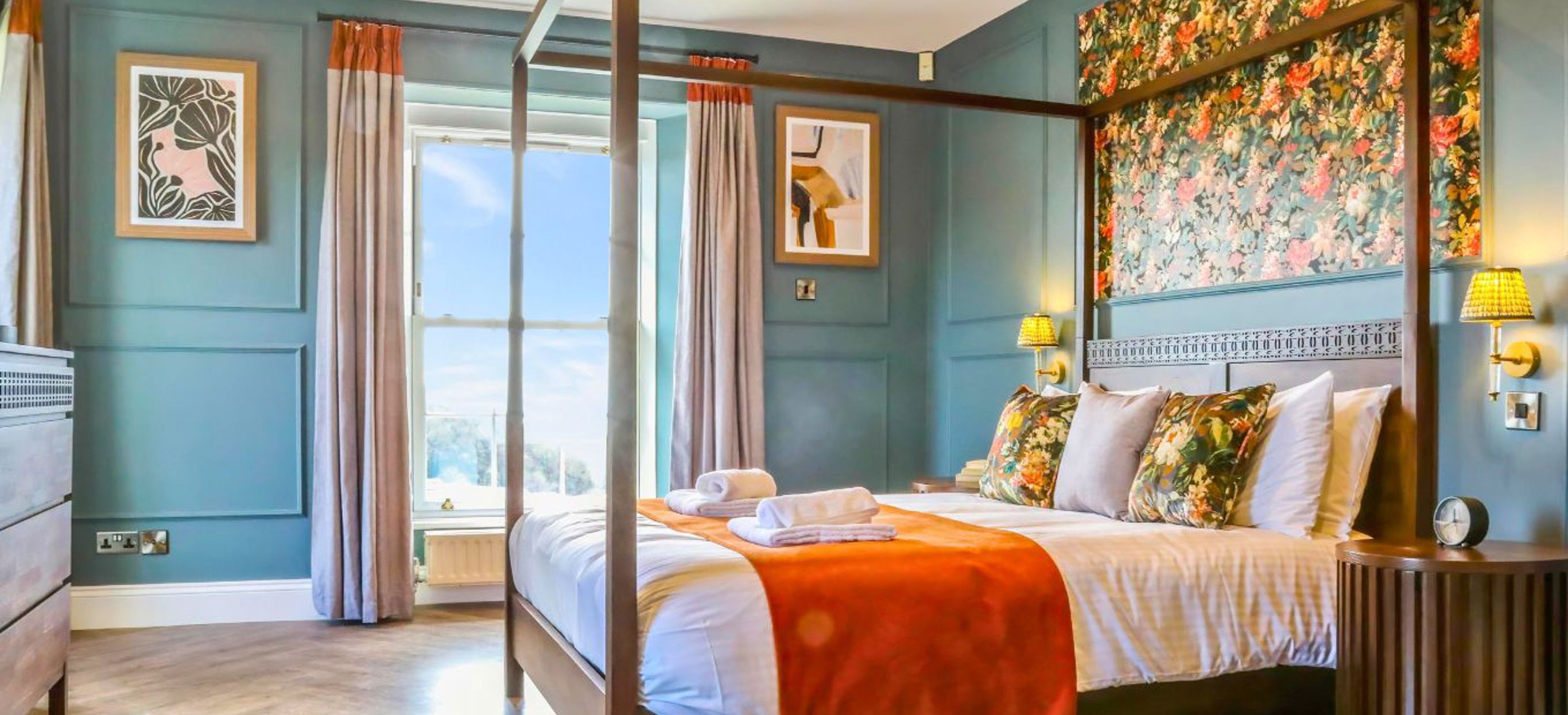 Internal of a manor house master bedroom with four poster bed 