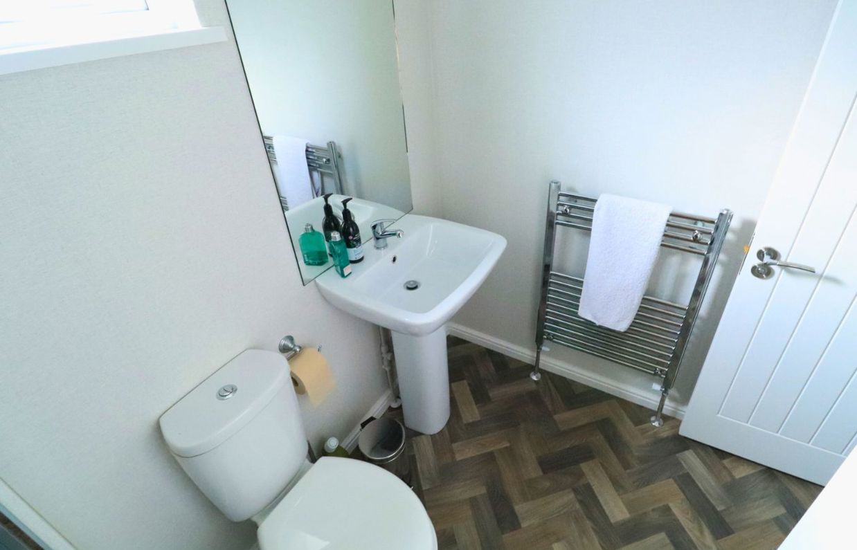 Internal of a caravan bathroom with toilet and sink