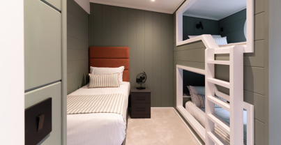 Cosy bedroom with single bed and luxury bunk bed
