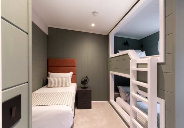 Cosy bedroom with single bed and luxury bunk bed