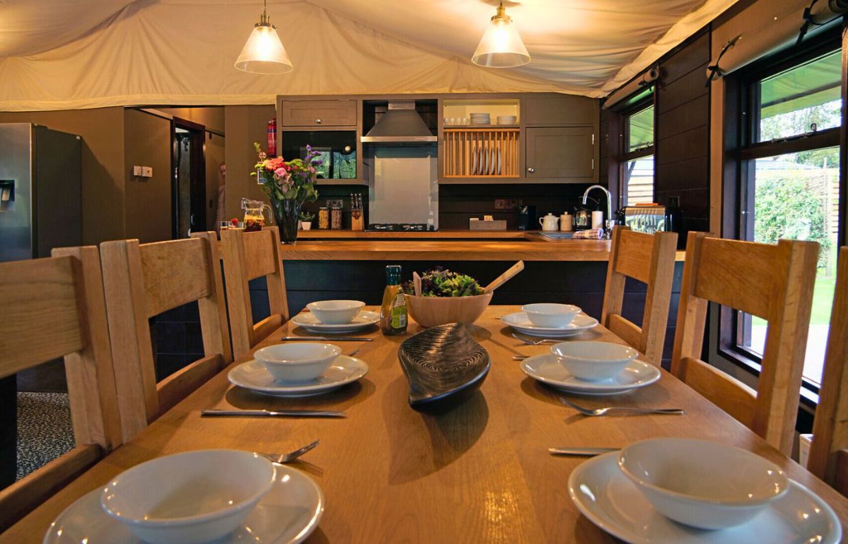 Internal of safari tent open plan kitchen diner