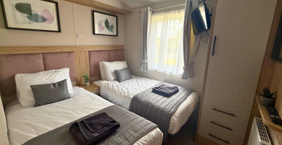 Internal of a caravan twin bedroom