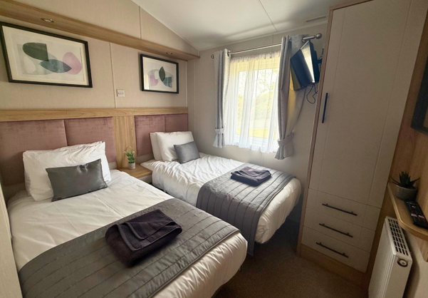 Internal of a caravan twin bedroom