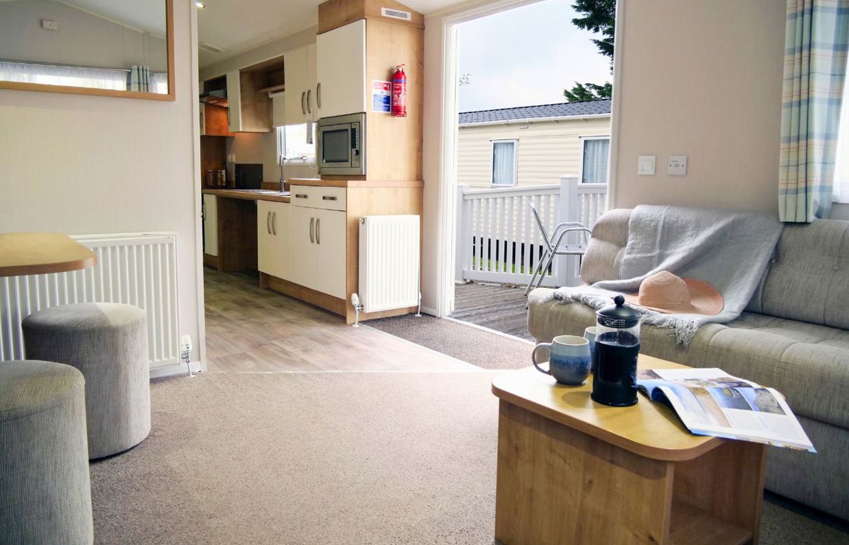 Internal of an accessible caravan spacious open plan living area and wide front door