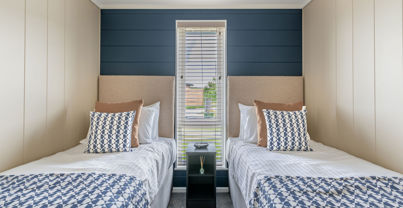 Internal of a luxury lodge twin bedroom