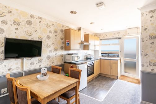 Open plan living space in Chesil Beach apartments with seaviews
