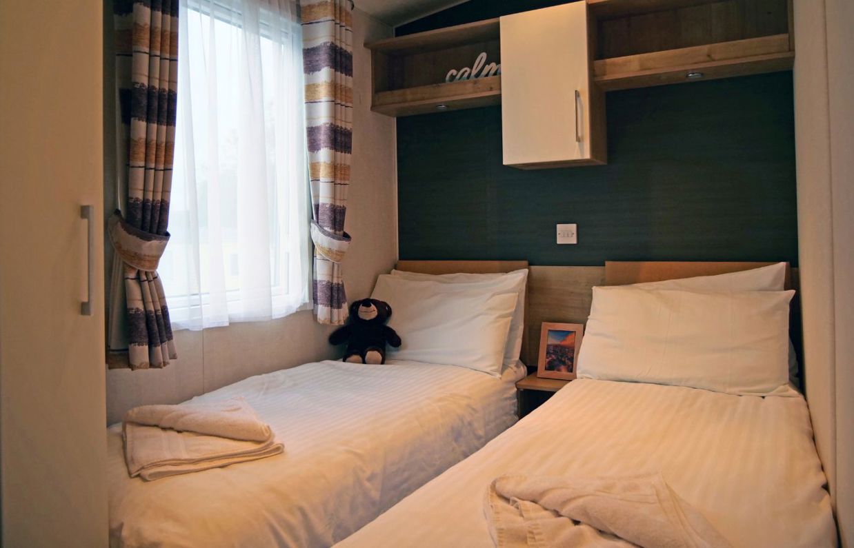 Internal of a caravan twin bedroom