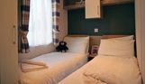 Internal of a caravan twin bedroom
