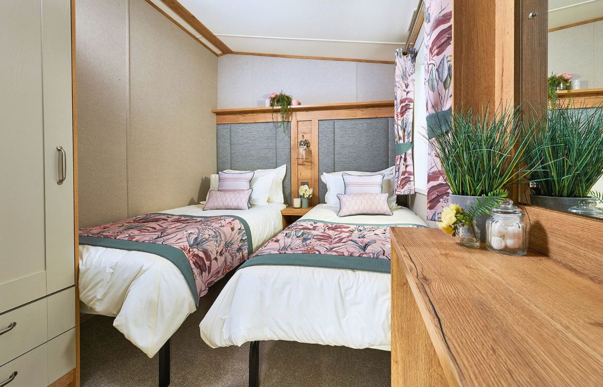 Internal of a caravan twin bedroom