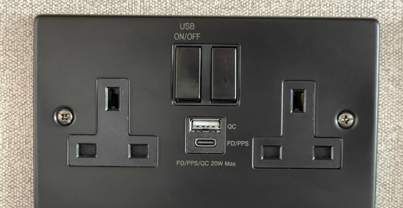 Plug socket in a caravan with USB and USB-C sockets