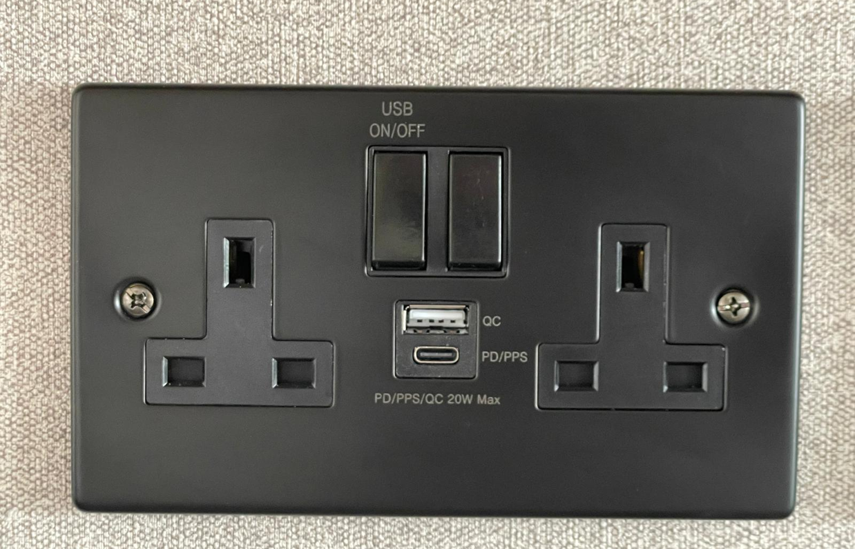 Plug socket in a caravan with USB and USB-C sockets