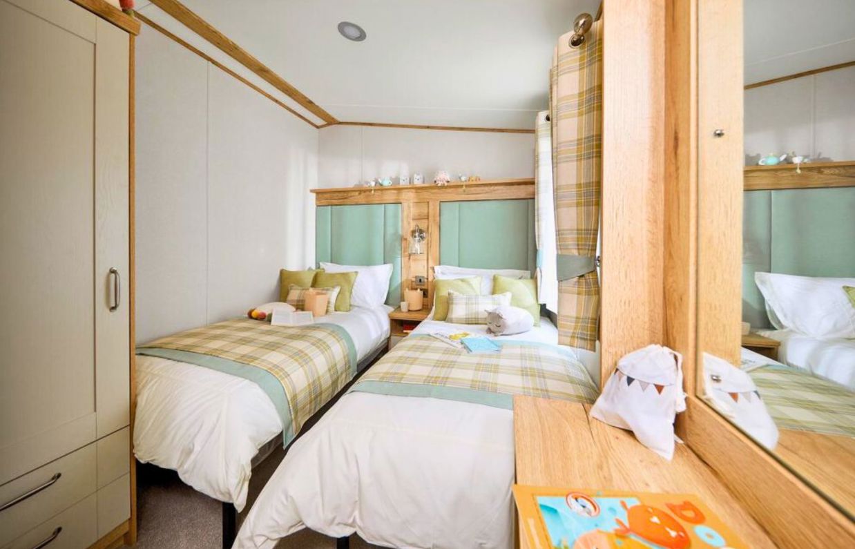 Internal of a caravan twin bedroom