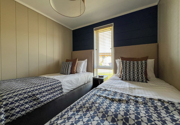 Internal of a luxury lodge twin bedroom