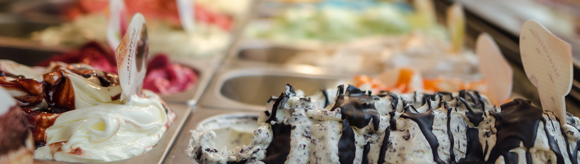 A selection of ice cream flavours in tins