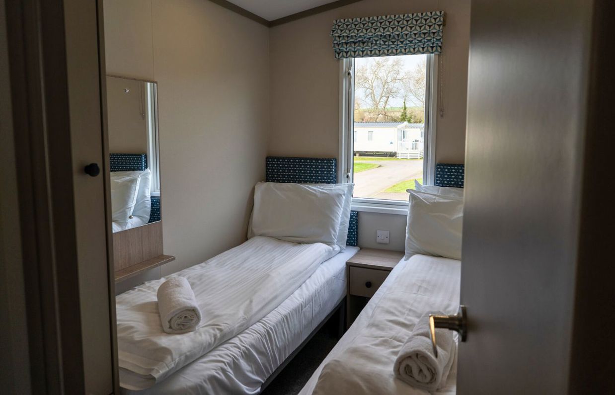 Internal of a caravan twin bedroom