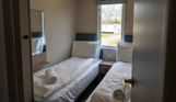 Internal of a caravan twin bedroom