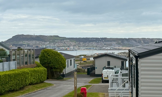 Views of Portland and the Jurassic Coast from the decking of Chesil Beach caravan 