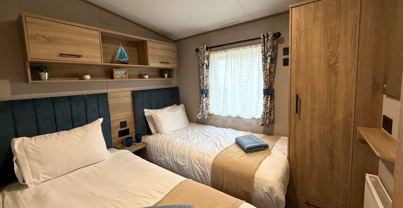 Internal of a caravan twin bedroom