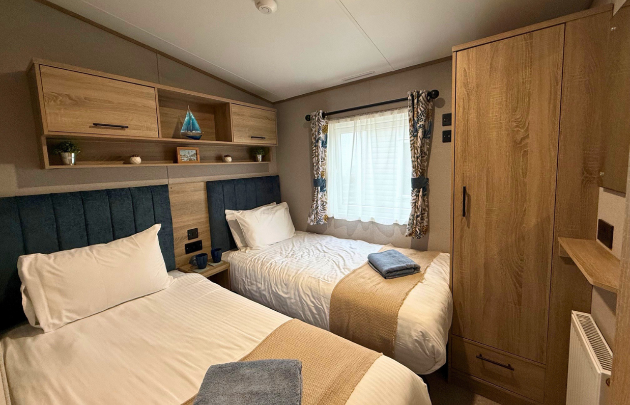 Internal of a caravan twin bedroom