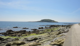 The view of Looe Island from Hannafore on a calm sunny day