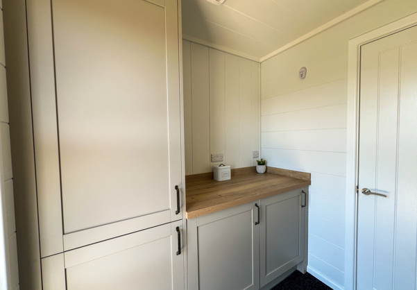 Internal of a luxury lodge entranceway boot room with storage
