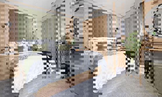 Internal of a caravan master bedroom with ensuite