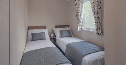 Internal of a caravan twin bedroom