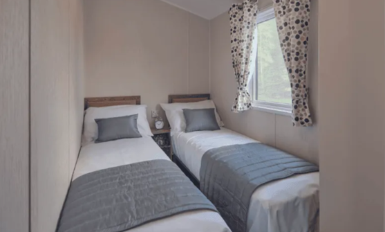 Internal of a caravan twin bedroom