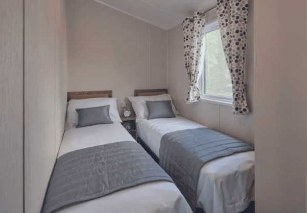 Internal of a caravan twin bedroom
