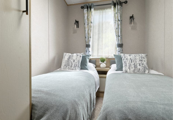 Internal of a caravan twin bedroom