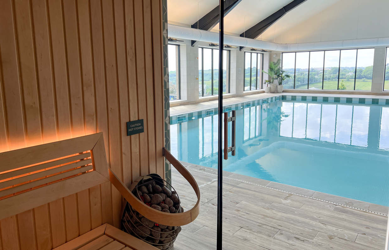 Sauna and indoor swimming pool within a barn style building