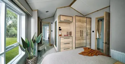 View of built-in wardrobe and through to master en suite