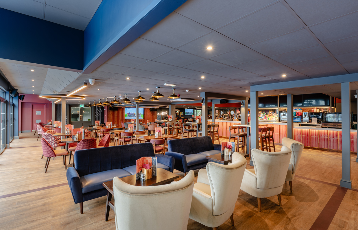 Internal of the Arena Sports Bar indoor seating arrangement with sofas