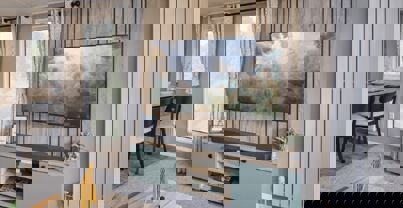 TV unit and storage cupboard against natural wood features