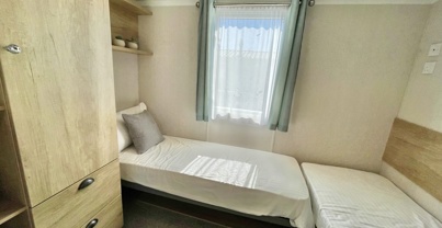 Internal of a caravan twin bedroom