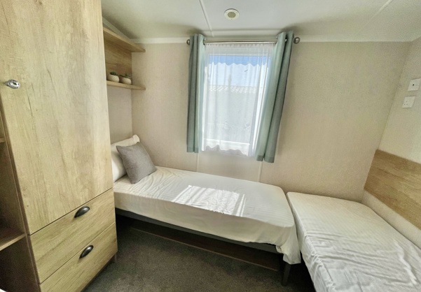 Internal of a caravan twin bedroom