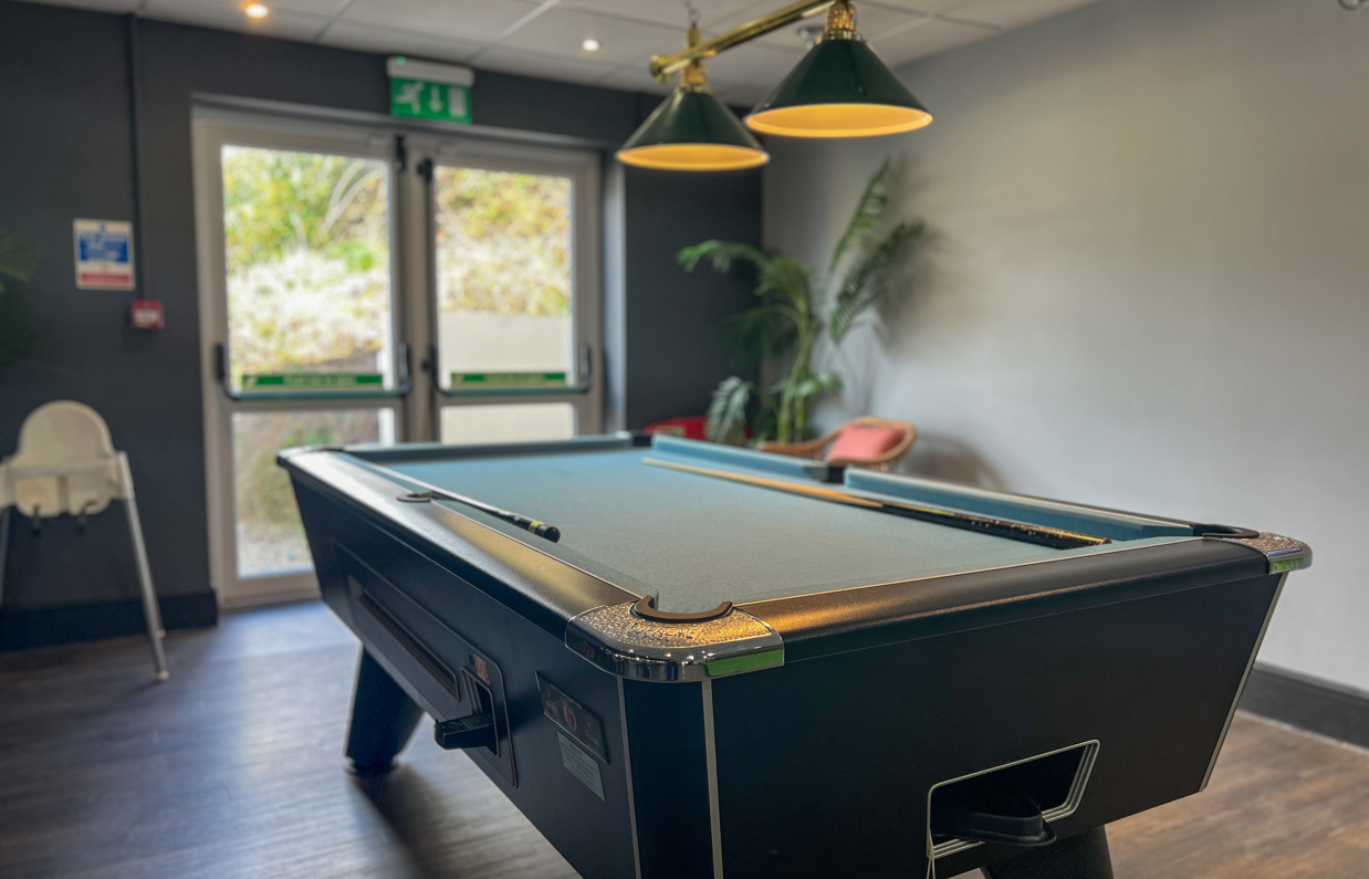 Pool table in games area of Family Room at Stargazy Bar & Grill