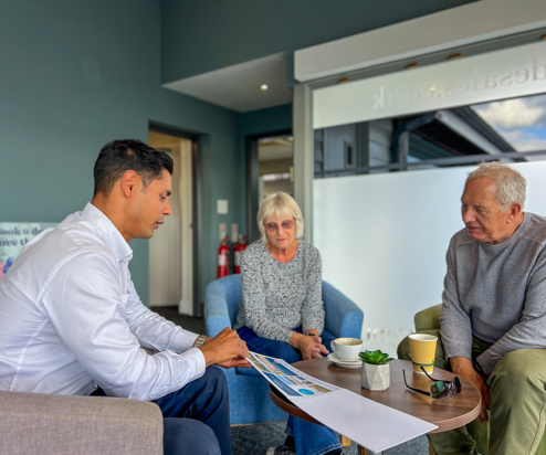 Couple talking with Sales Team Member on an Experience Day