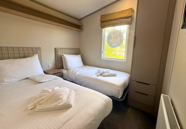 Internal of a caravan twin bedroom
