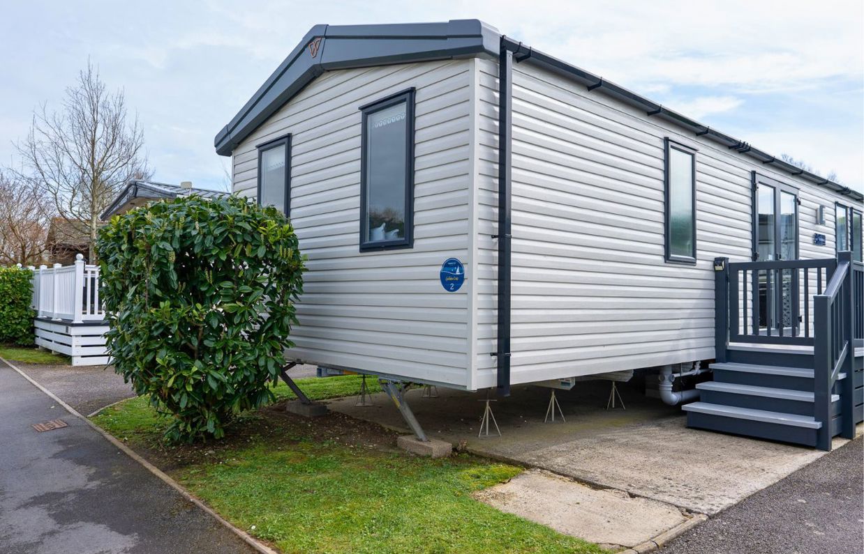 External of a caravan on pitch with decking