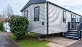 External of a caravan on pitch with decking