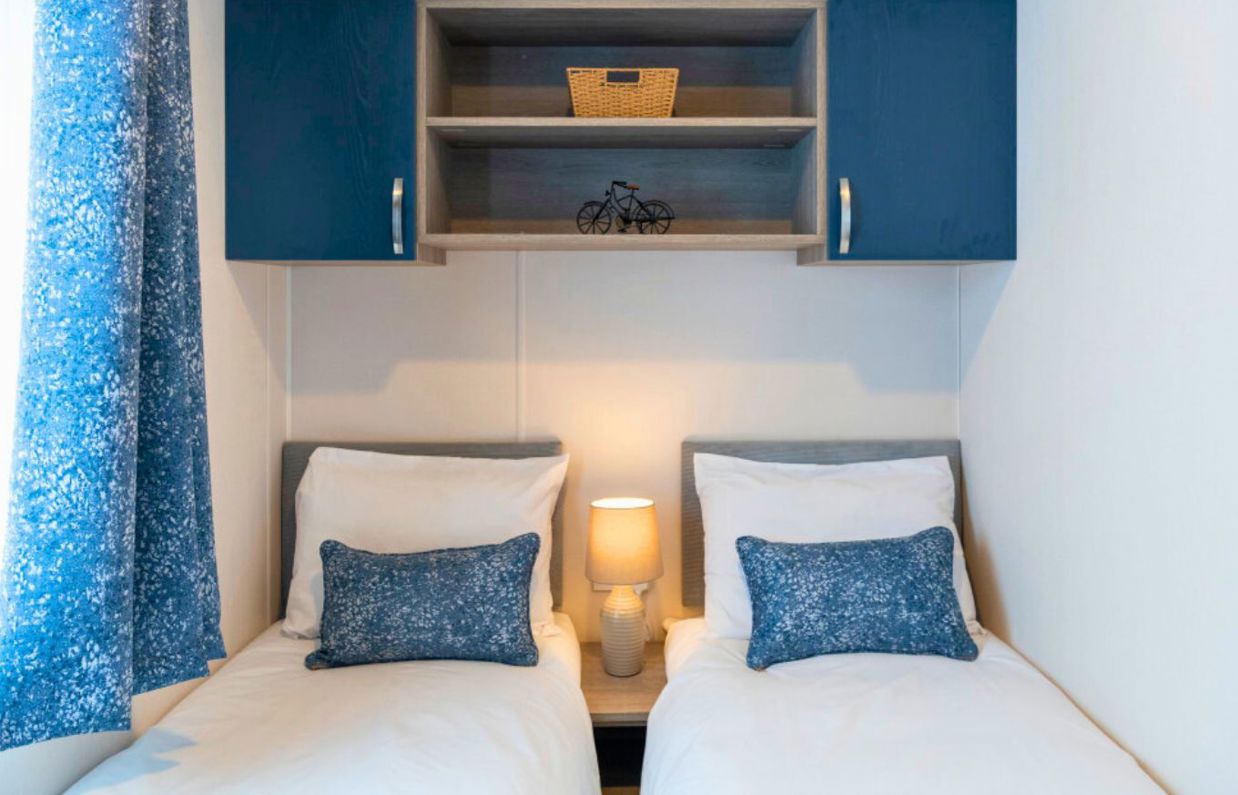 Internal of a caravan twin bedroom