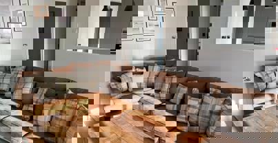 Large comfy leather sofa in open plan living area