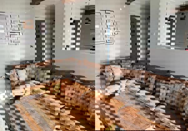 Large comfy leather sofa in open plan living area