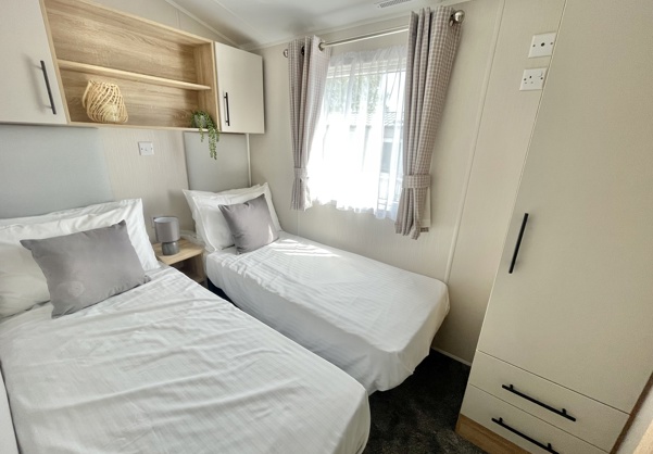 Internal of a caravan twin bedroom