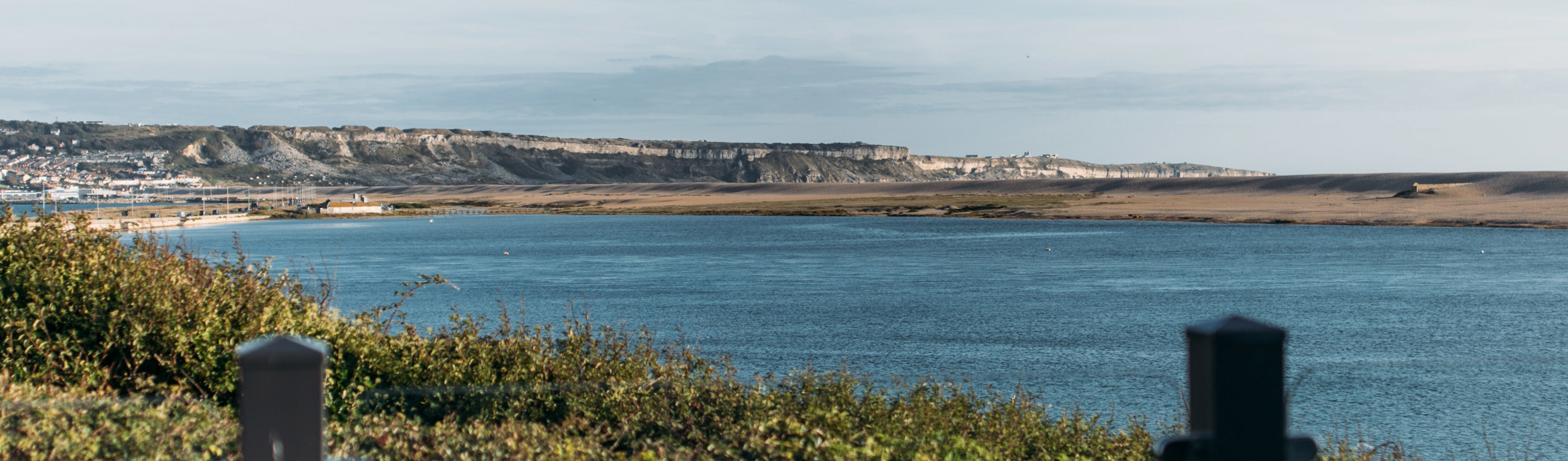 View of Portland coast from Chesil Beach Holiday Park