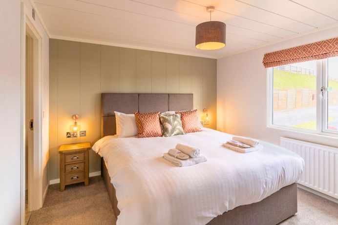 Internal of a luxury lodge master bedroom with ensuite