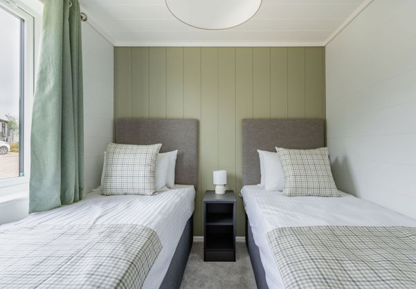 Internal of a luxury lodge twin bedroom